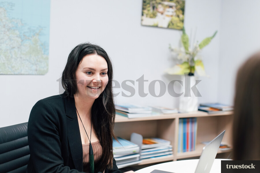 Woman in Meeting at Work