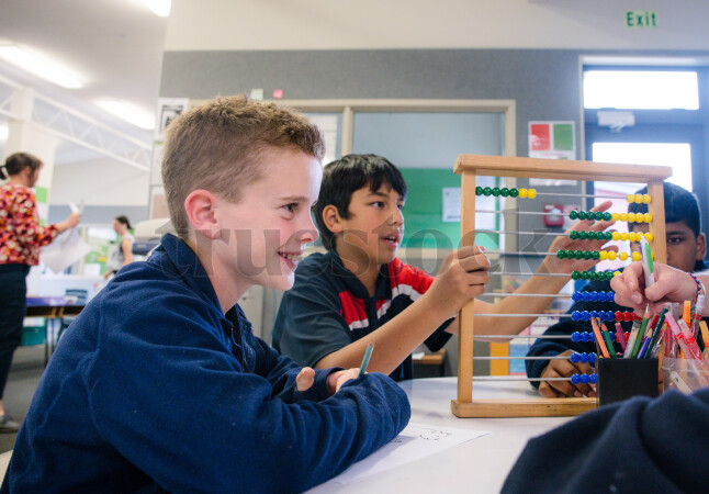 Student Using Abacus