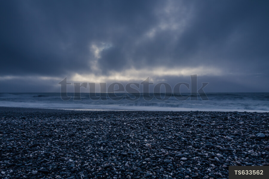 Clouds above beach in Bruce Bay