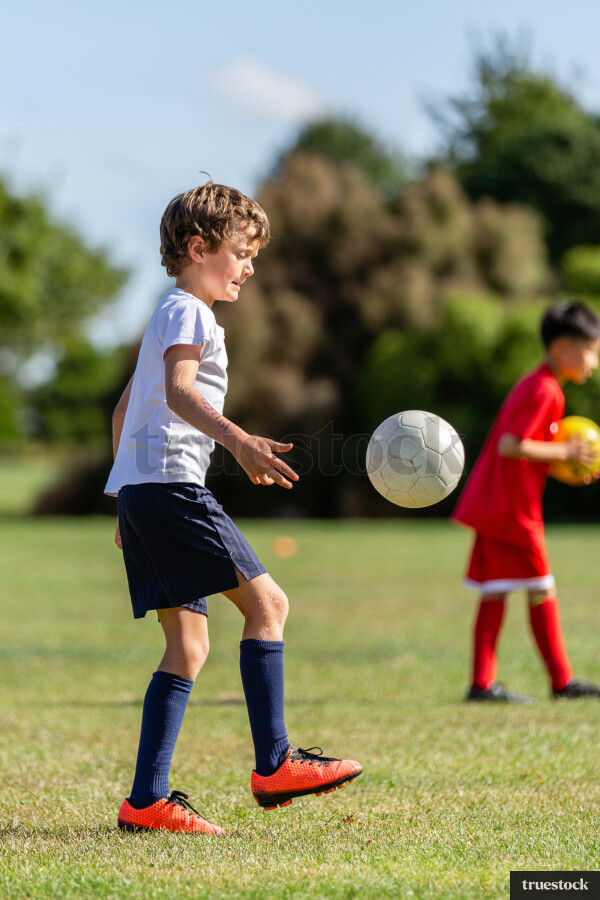 Boy playing soccer