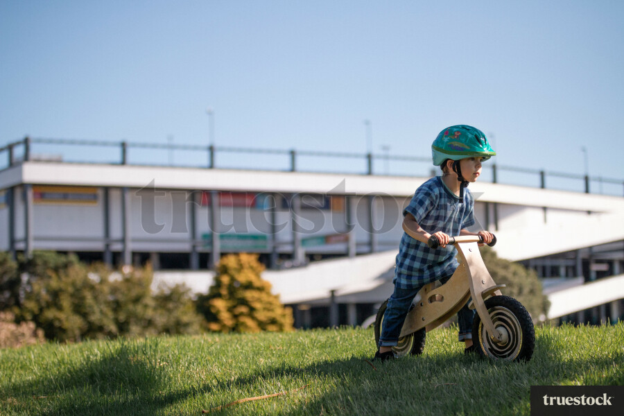 Child going for a bike ride on a pushbike