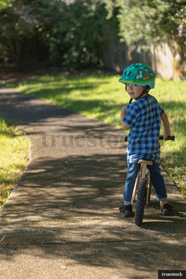 Child going for a bike ride on a pushbike