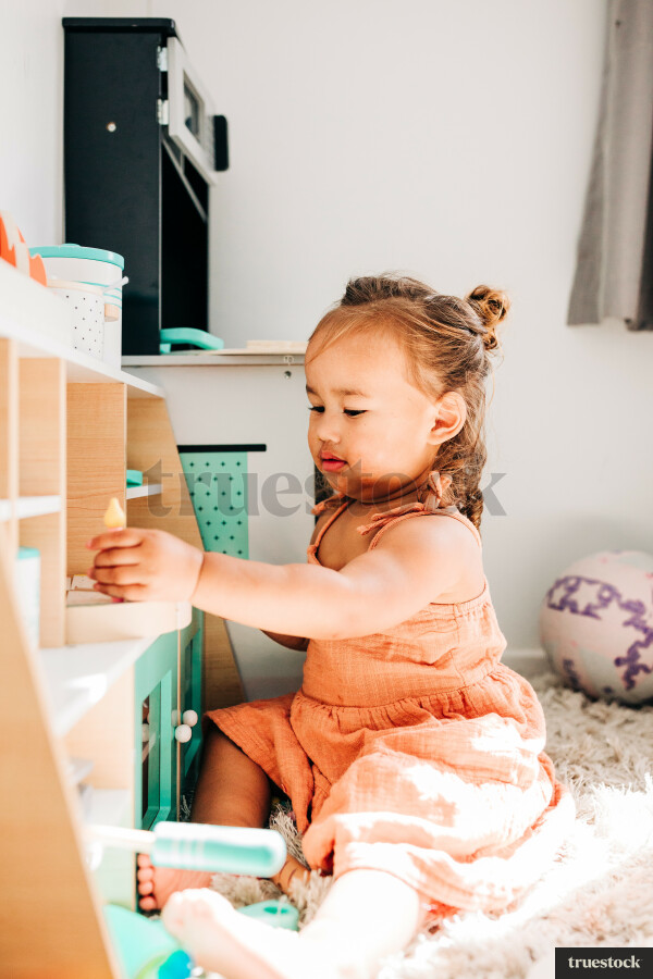 Māori girl playing in her room