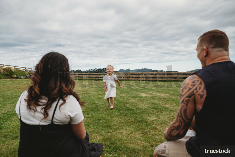 Parents watching Daughter