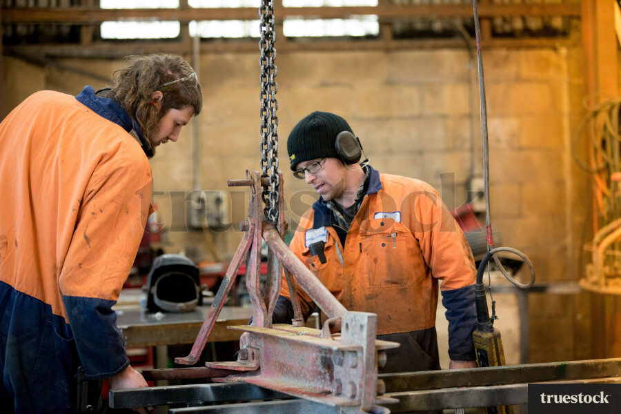 Welder in the engineering workshop working