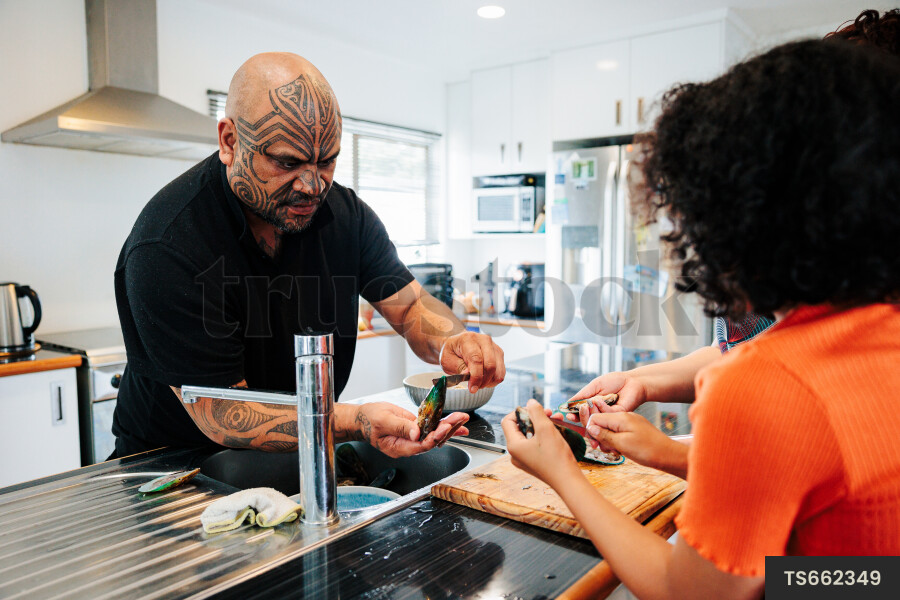 Family Shucking Mussels