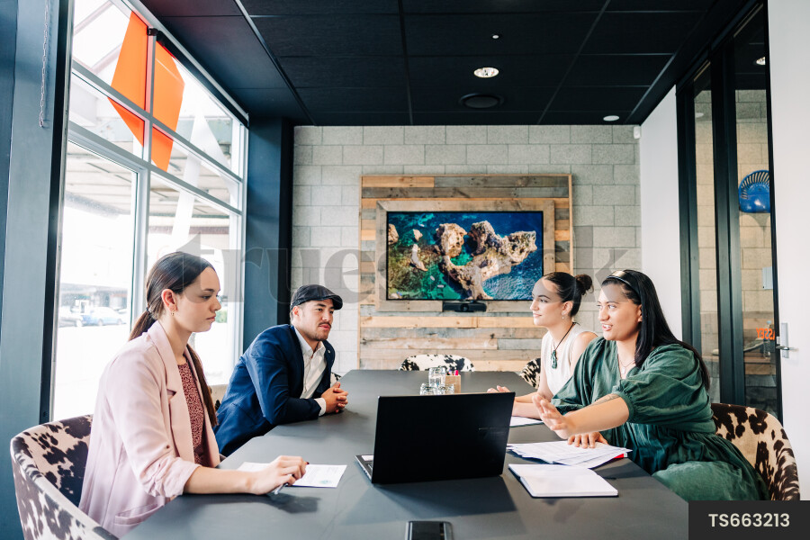 Businesspeople talking during meeting in boardroom