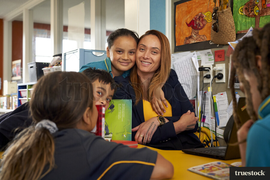 Students and Teacher Discussing Books