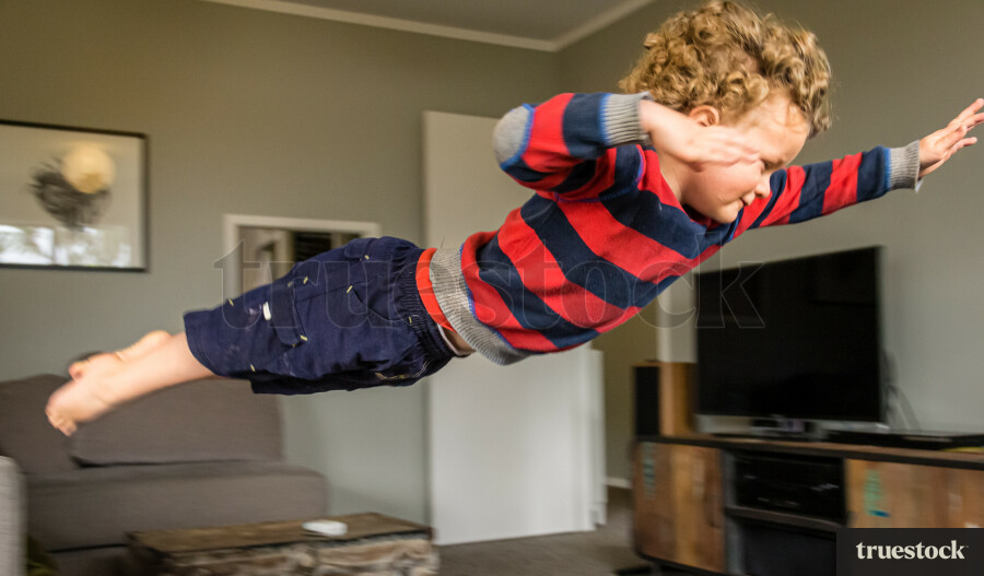 Boy flying through the air