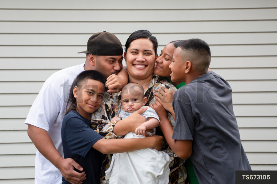 Portrait of happy affectionate tongan family