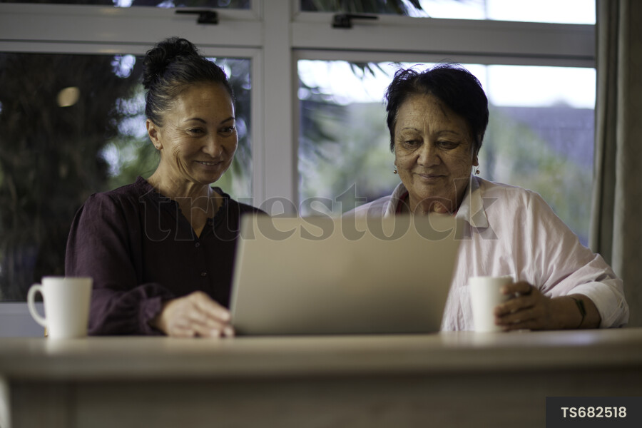 Grandma and Mother Using Laptop