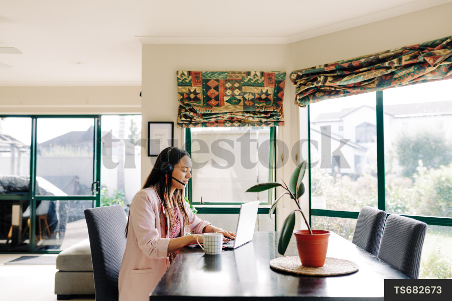 Businesswoman working from home
