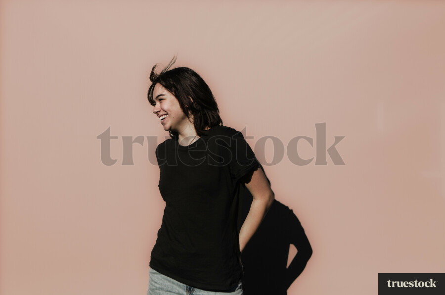 Māori Woman against a Plain Background