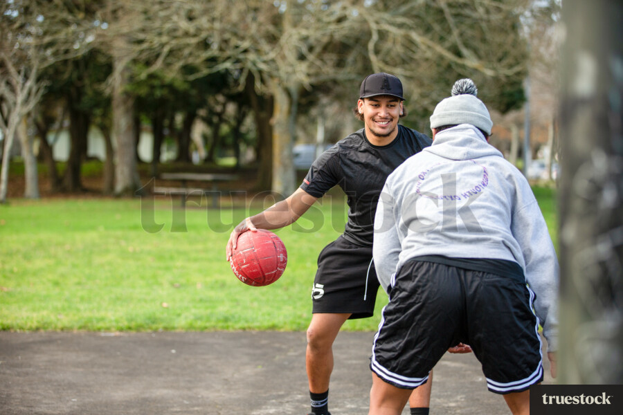 Mates Playing Basketball Together