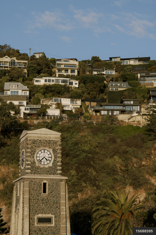 Clock tower and houses on hill