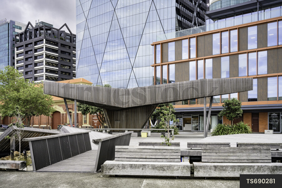 Benches and bridge outside office buildings