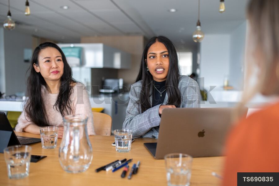 Colleagues Have Meeting at Work