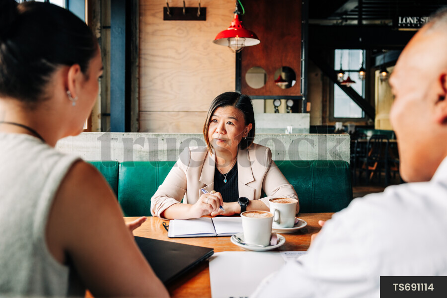 Businesspeople meeting at cafe