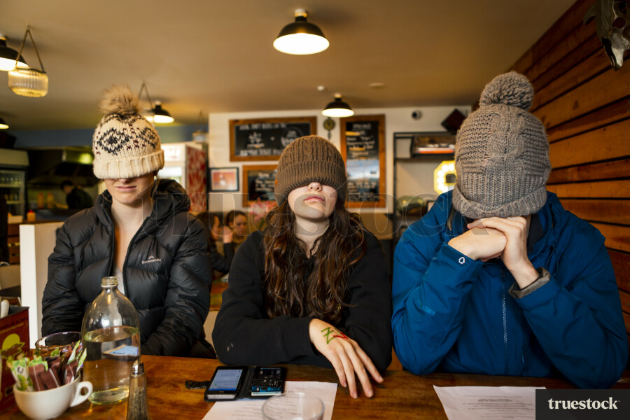 Teenager Wearing Beanie in Restaurant