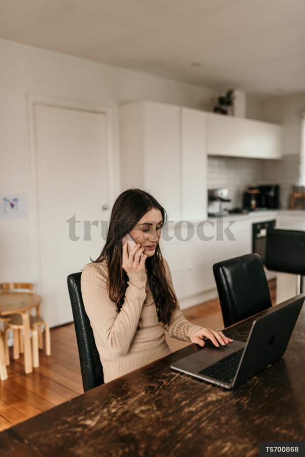 Mother Using Laptop