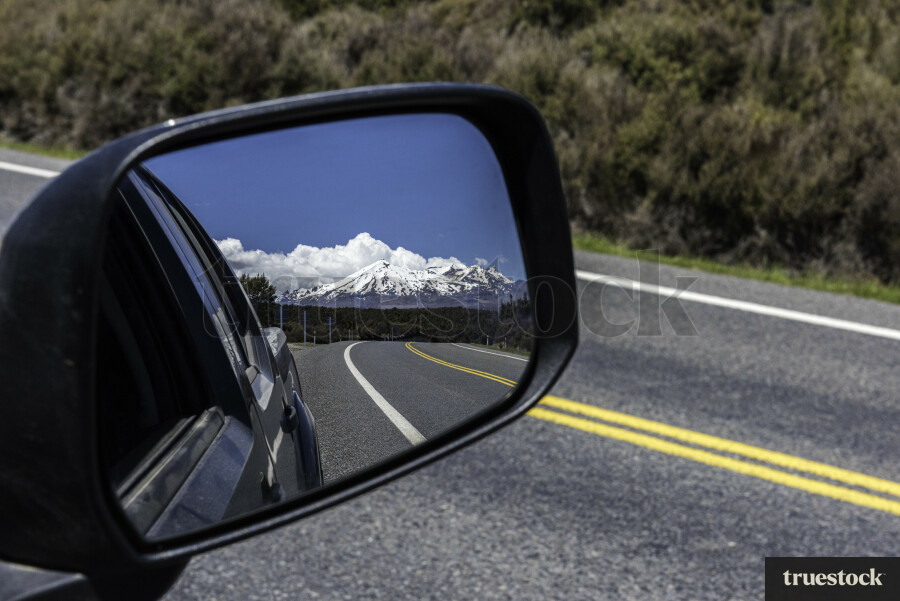 Mountain in Car Mirror Reflection