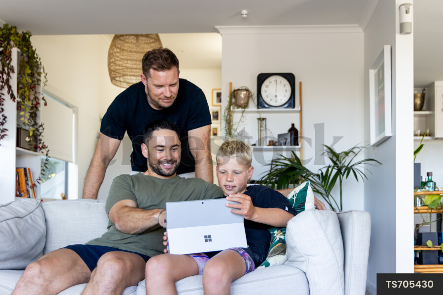 Father and Son Using Laptop