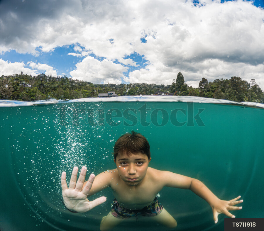 Boy swimming underwater