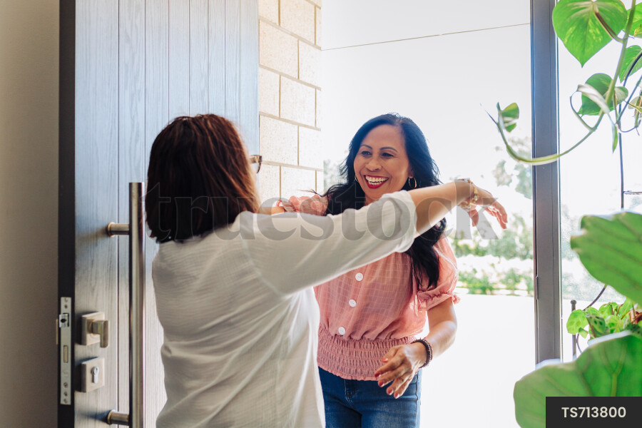 Women Greeting Each Other