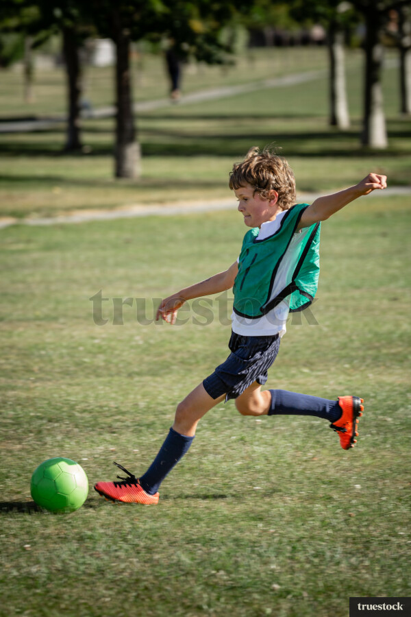 Boy playing soccer