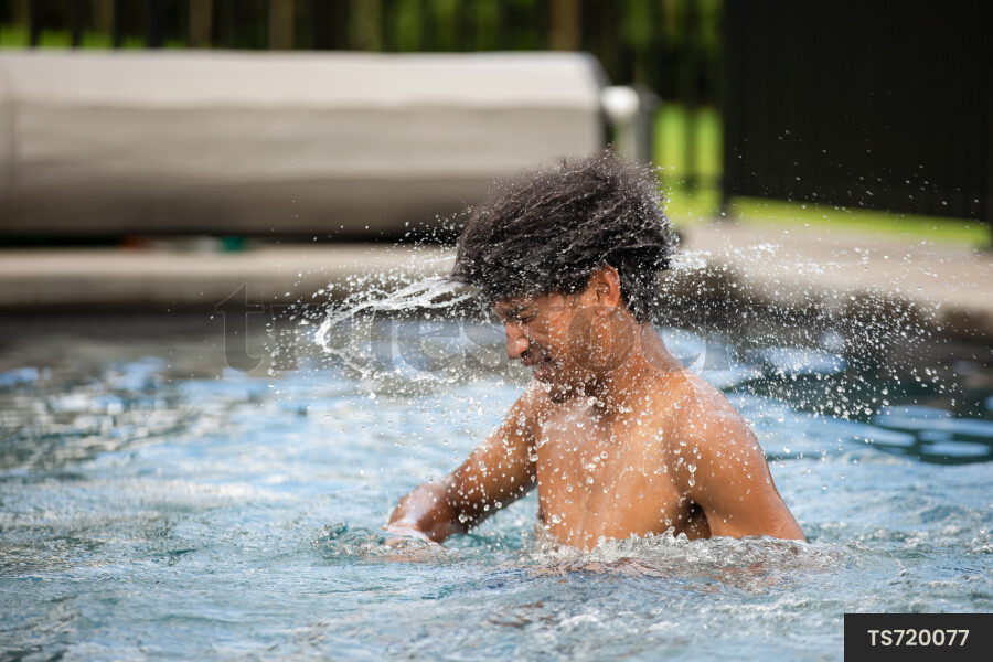 Teens Playing in Pool