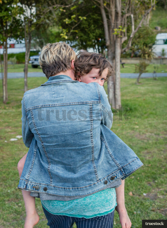 Mum giving child a hug