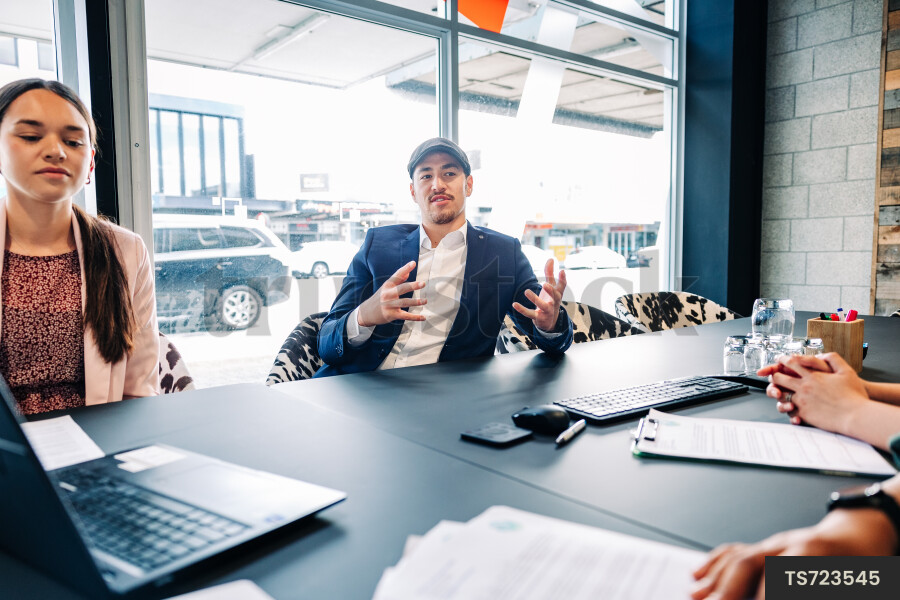 Businesspeople talking during meeting in boardroom