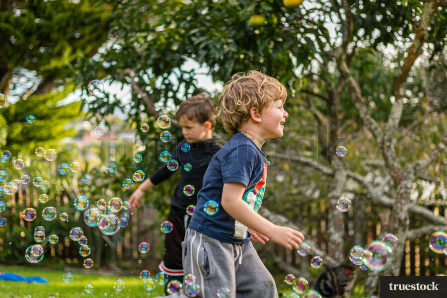 Children playing with bubbles