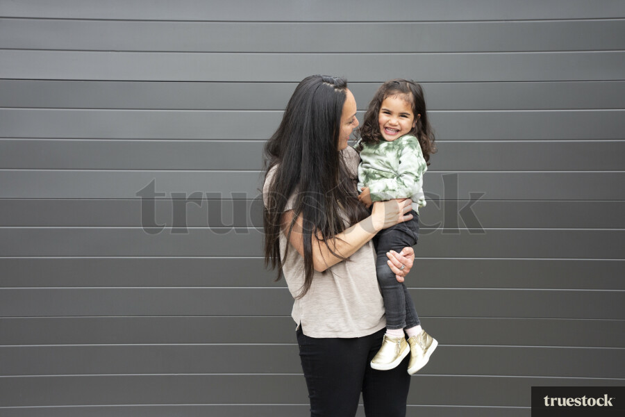 Mother Holding Daughter