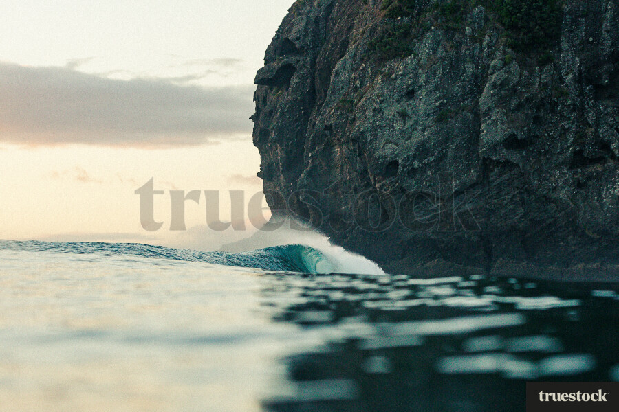 Wave Crashing against Cliff in Auckland