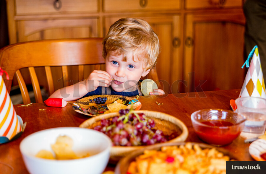 Toddler eating at the table