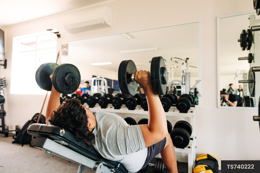 Teenagers Working Out at Gym