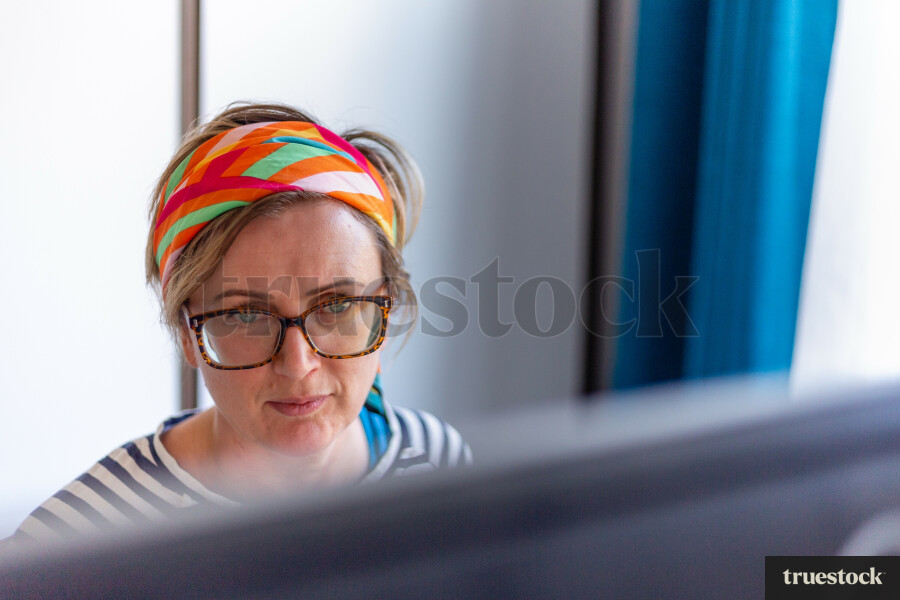 Adult working from home in home office