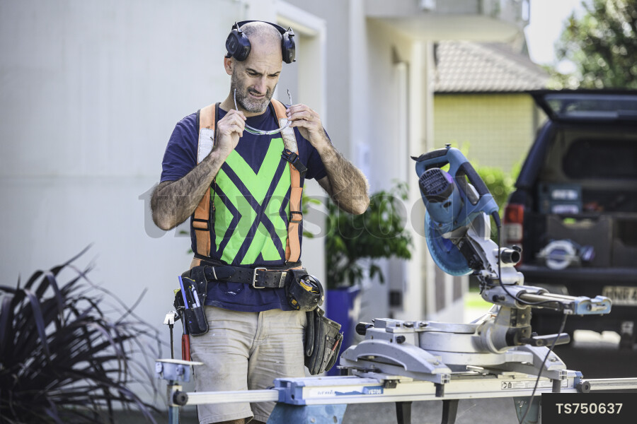 Tradie Using Tools