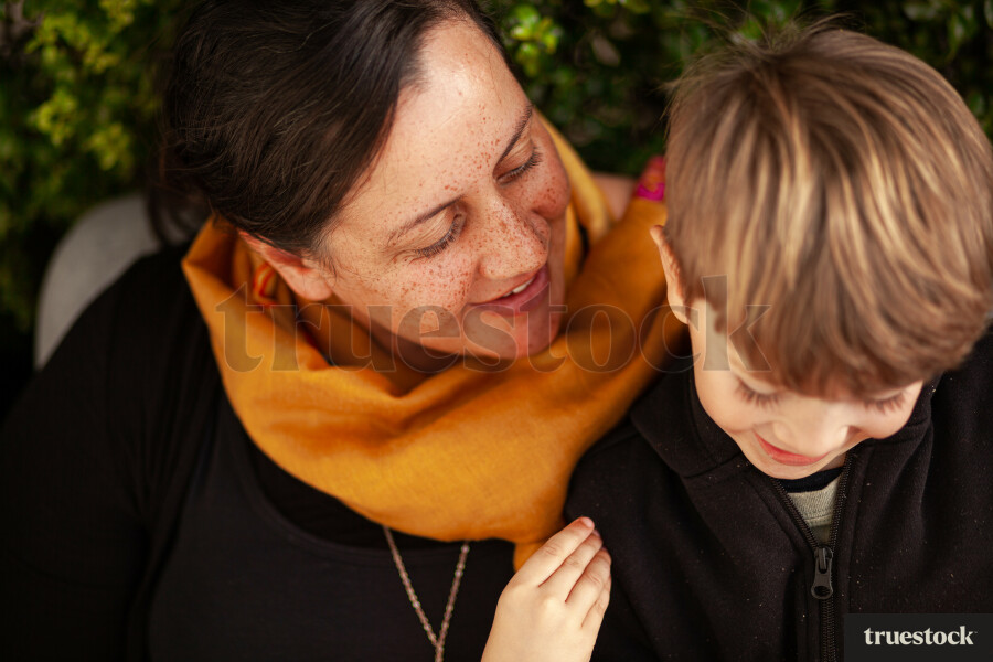 Mother and son hugging