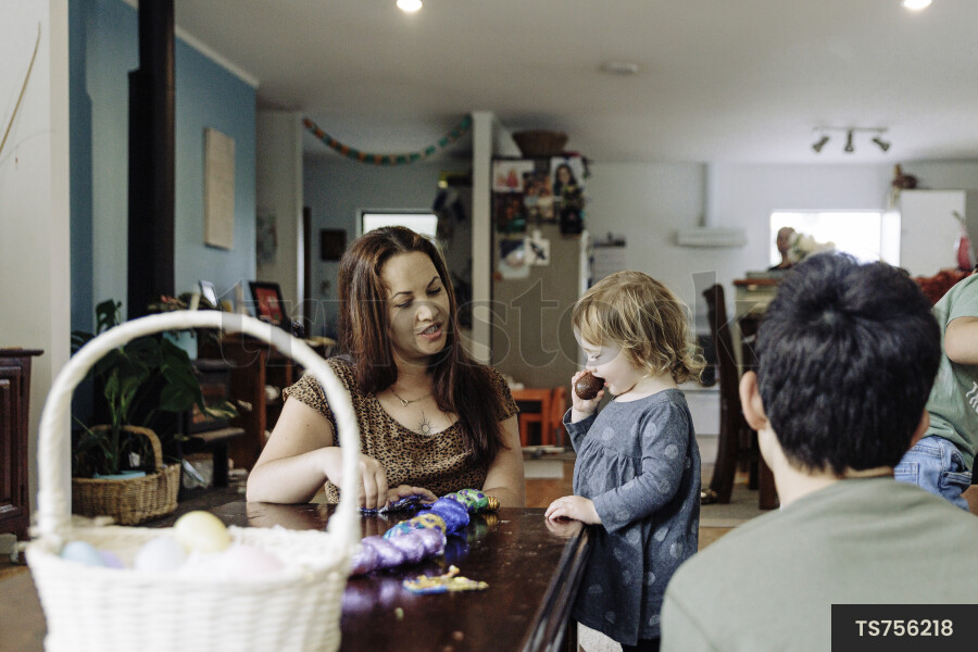 Young Girl Eating Easter Eggs