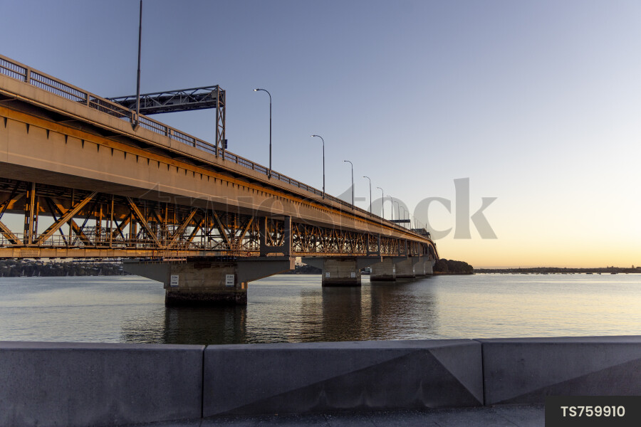 Landscape of bridge in harbour during sunrise