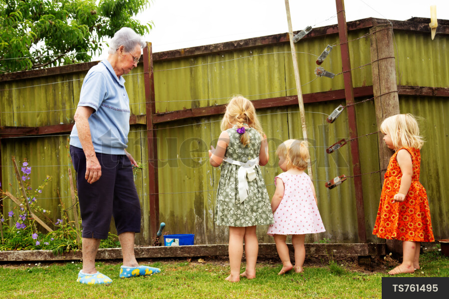 Woman playing with her granddaughters