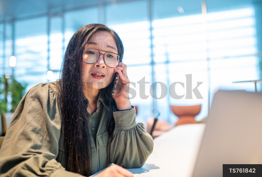 Woman on Phone at work