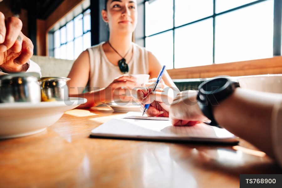 Businesspeople meeting at cafe