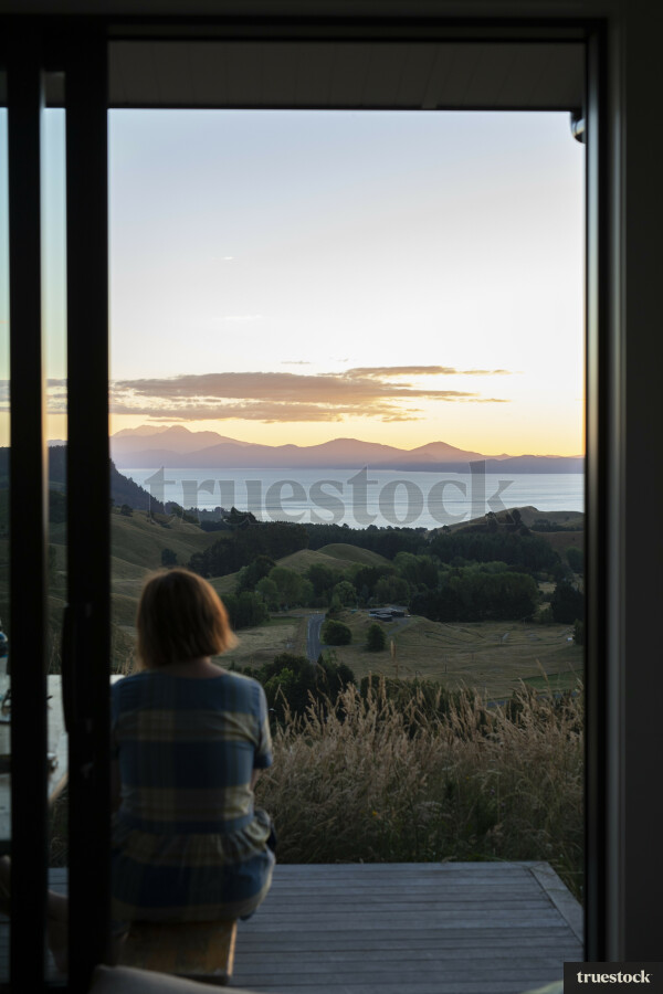 Lady sitting on deck