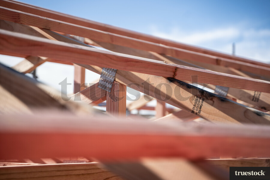 Close up of wooden frame of house under construction