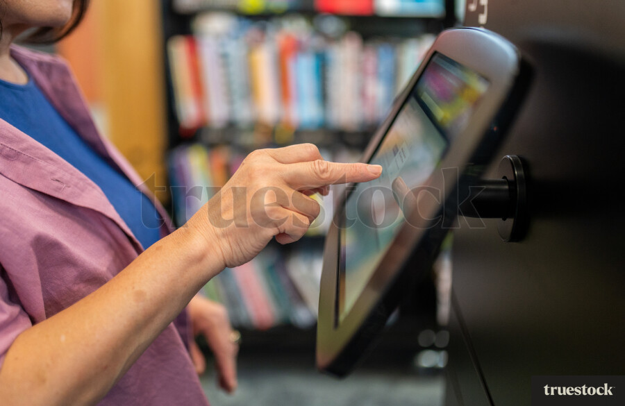 Woman Searching For Books