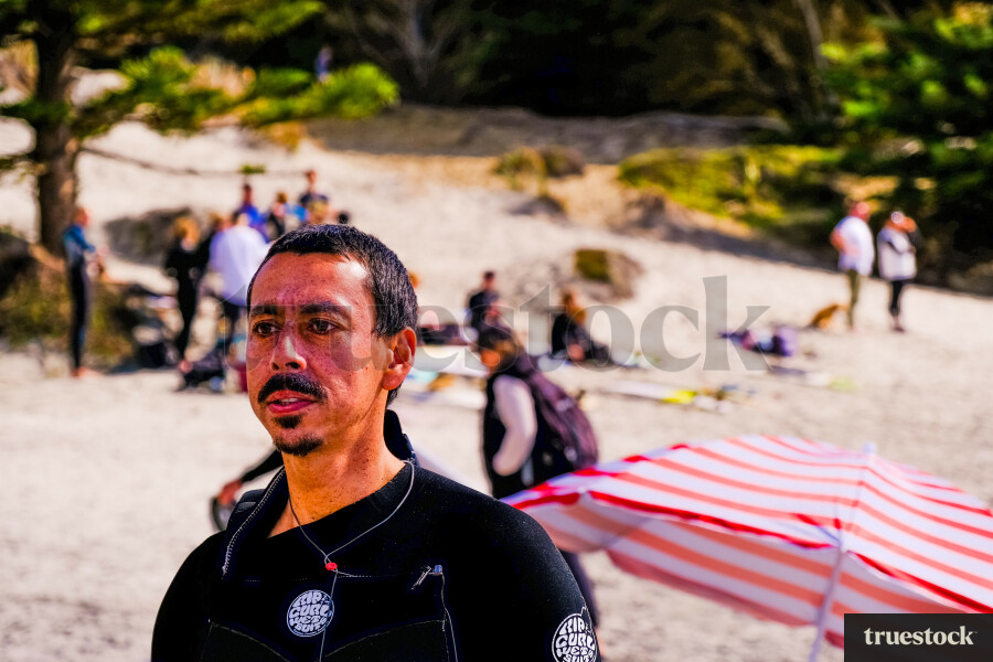 Surfer at Forestry Beach, Te Arai