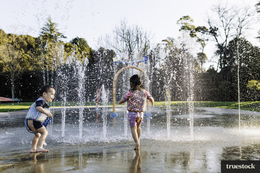 Young Girl Playing in Water